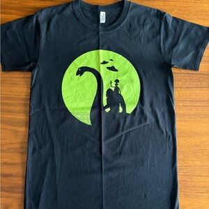 FUN RIDE: Alien rides Blackfoot who rides the Loch Nest Monster Black Tee